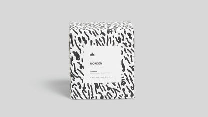 Product packaging with a black and white pattern on a gray background