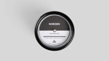 Round container with 'Norden' branding on a gray background