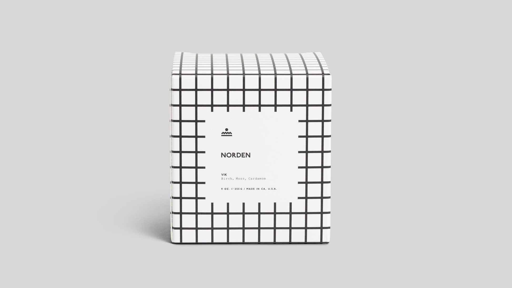 White box with black grid pattern and 'Norden' branding on a light gray background