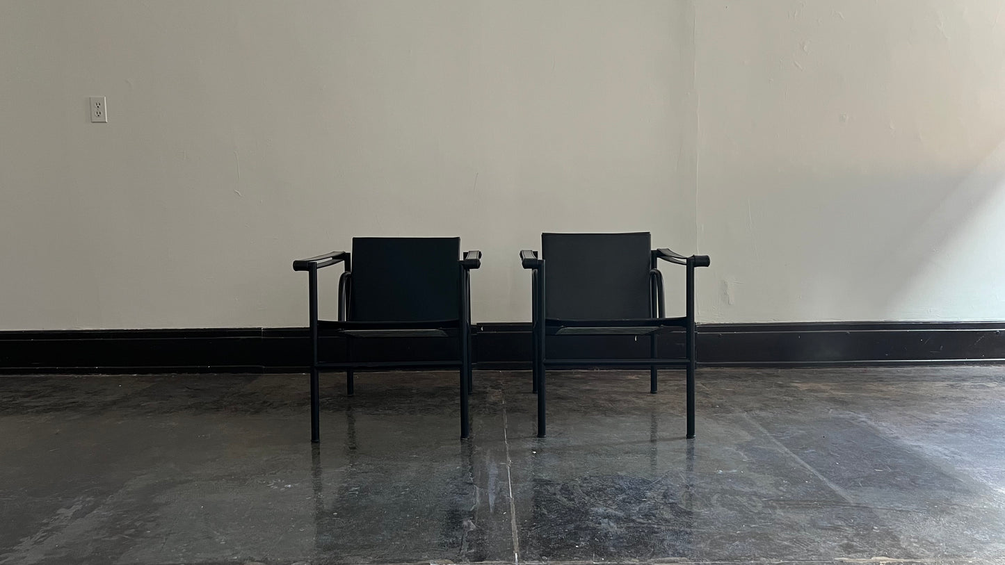 LC1 Chairs by Le Corbusier, Pierre Jeanneret, and Charlotte Perriand for Cassina (Pair)