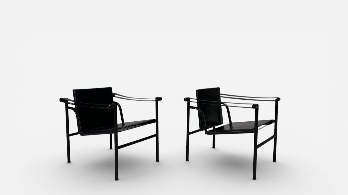 LC1 Chairs by Le Corbusier, Pierre Jeanneret, and Charlotte Perriand for Cassina (Pair)