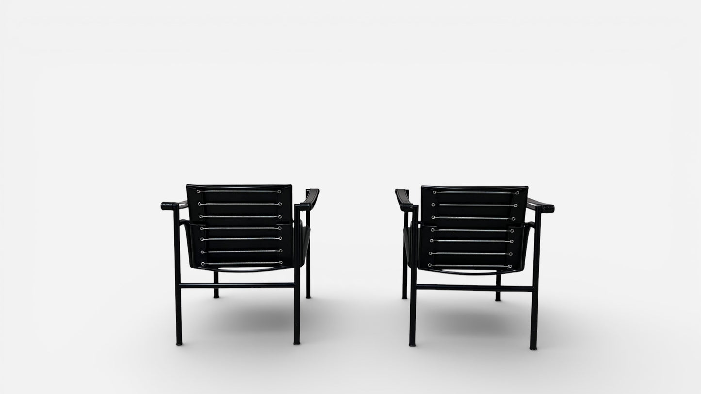 LC1 Chairs by Le Corbusier, Pierre Jeanneret, and Charlotte Perriand for Cassina (Pair)