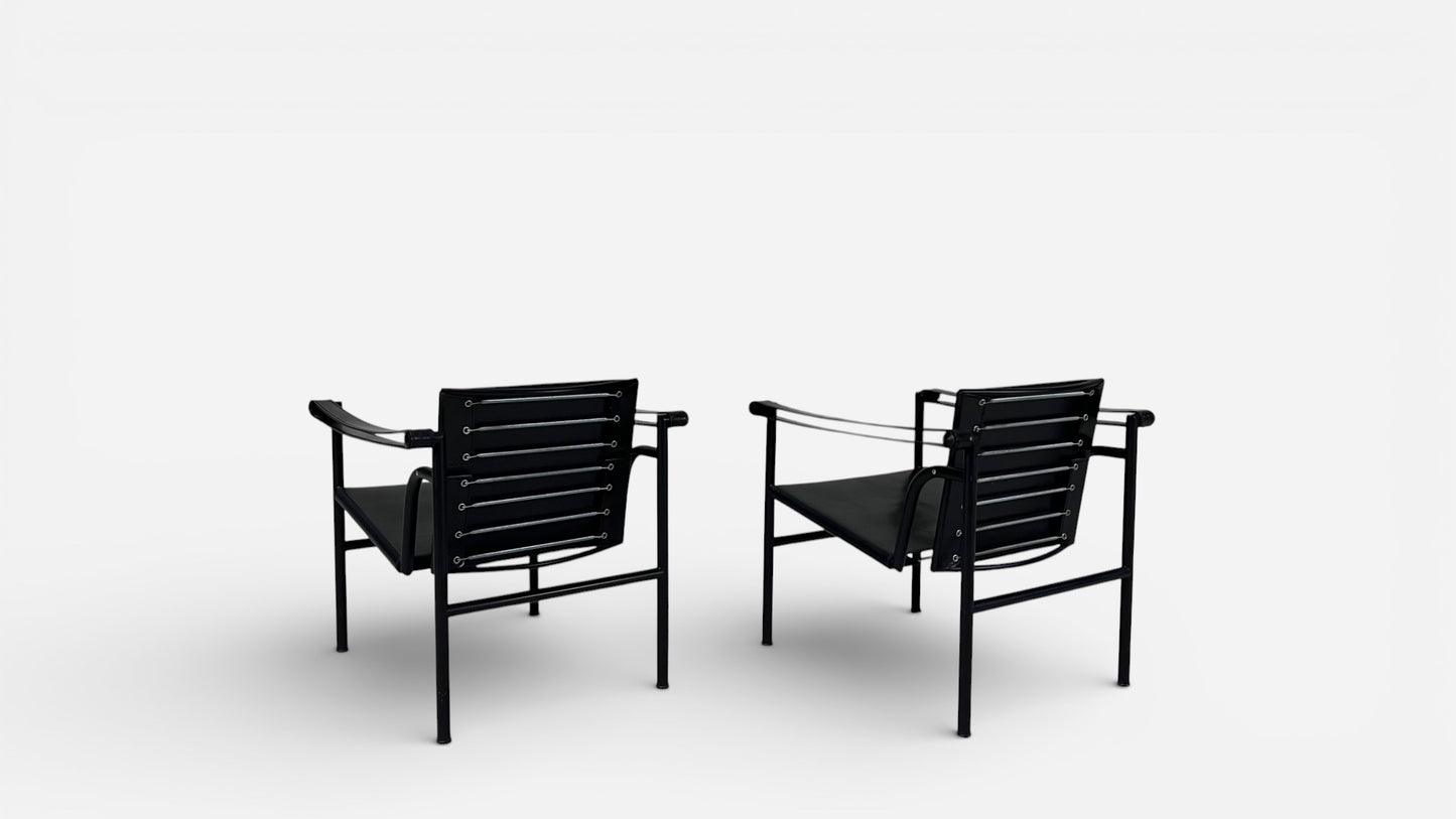 LC1 Chairs by Le Corbusier, Pierre Jeanneret, and Charlotte Perriand for Cassina (Pair)
