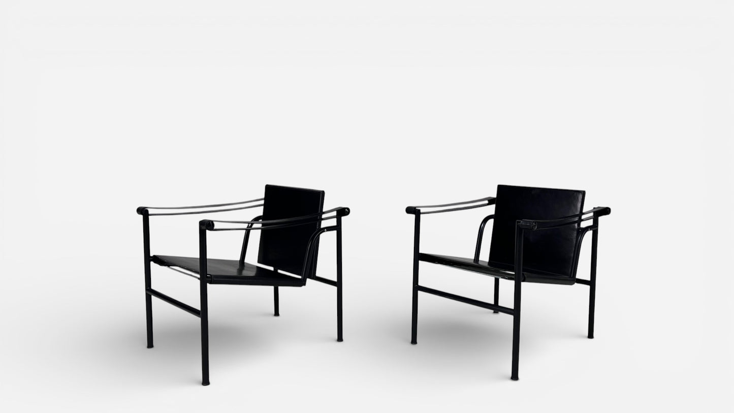 LC1 Chairs by Le Corbusier, Pierre Jeanneret, and Charlotte Perriand for Cassina (Pair)