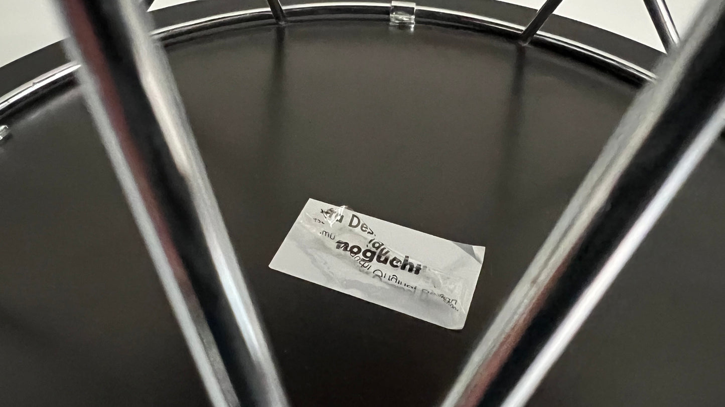 Low Rocking Stool by Isamu Noguchi reissued by Vitra